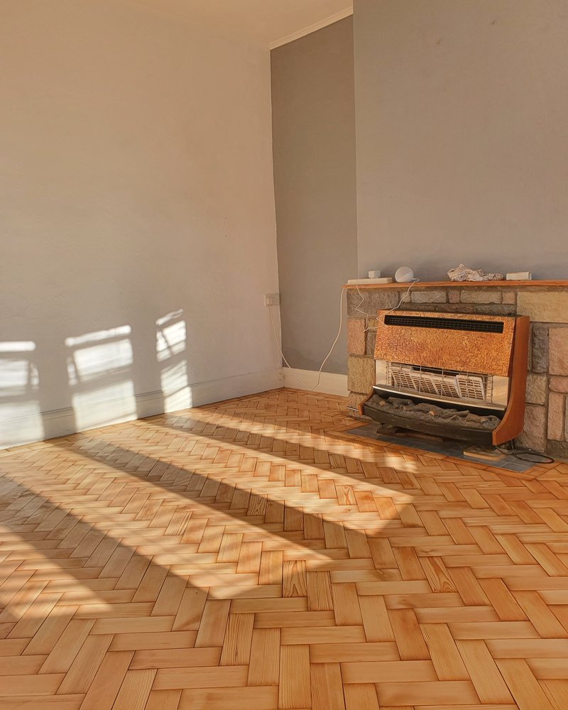 Restored parquet floor in sunlight