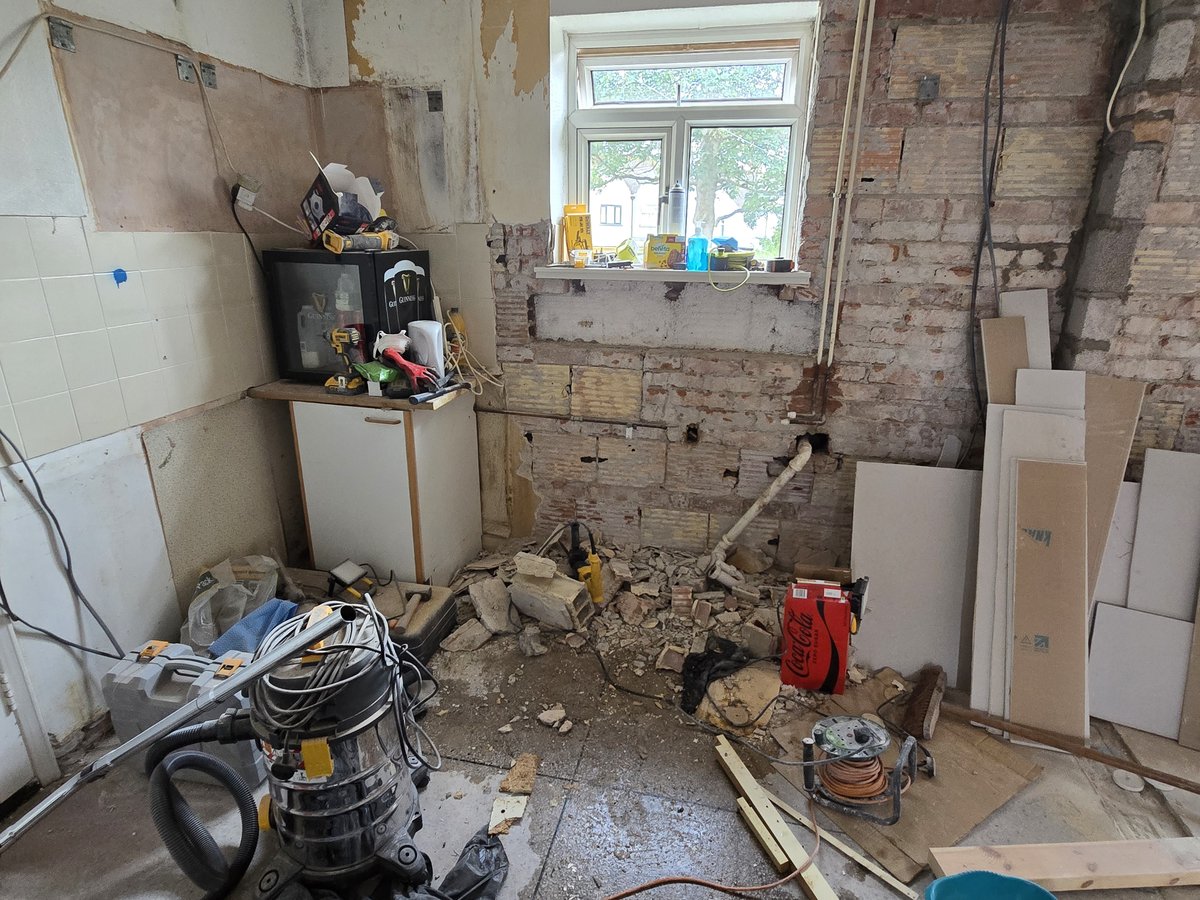 Stripped-out kitchen during refurbishment