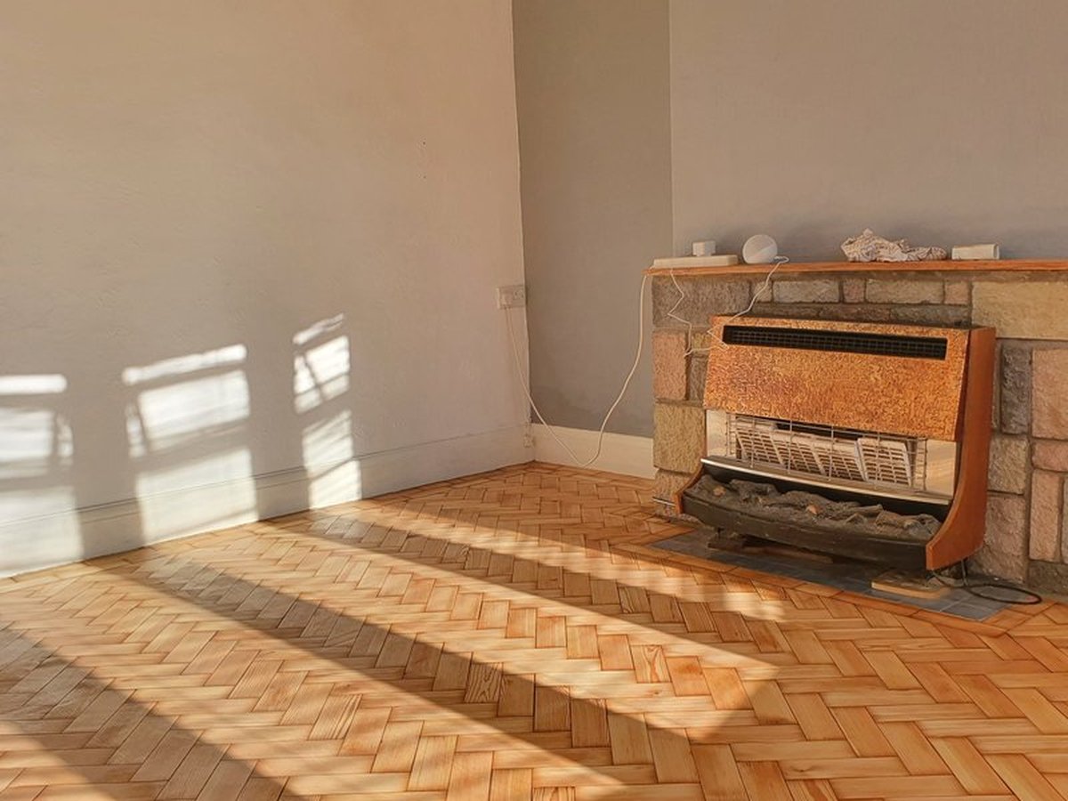 Restored parquet floor after sanding and re-treating